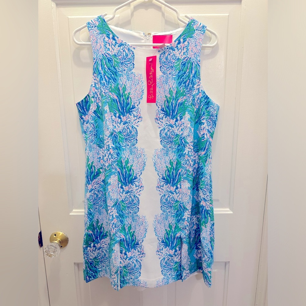 Cordelia Shift Romper in LAS OLAS AQUA
NWT, size 10